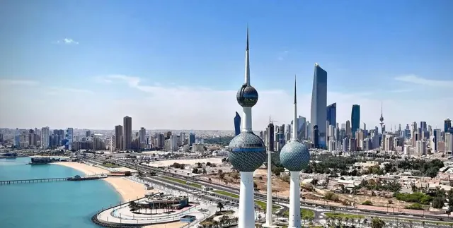 A wide view of the Kuwait skyline and towers